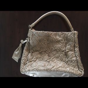 Ivanka Trump lux handbag in gold